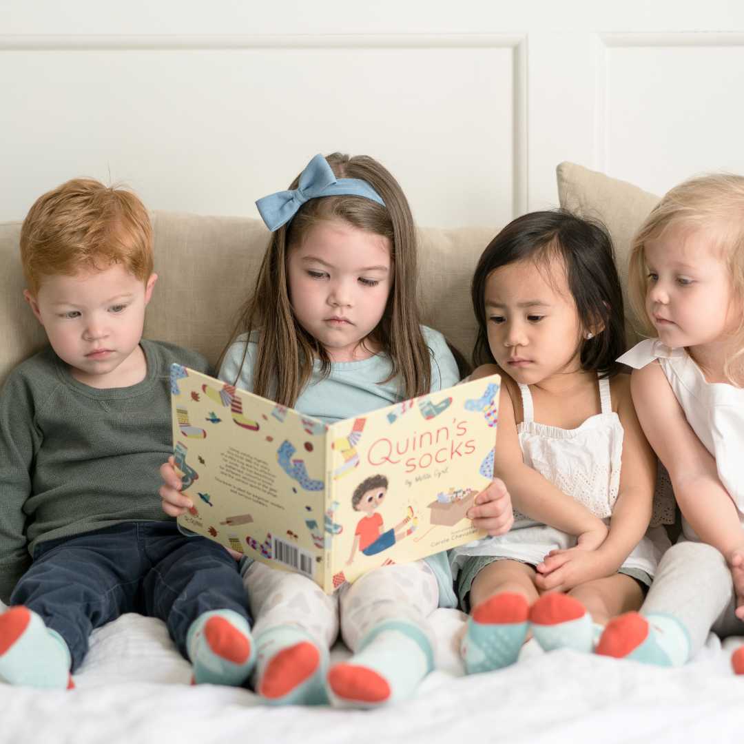 kids reading quinns socks book and matching socks