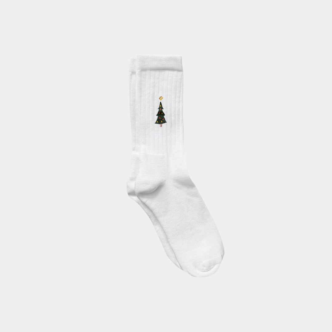 White sock with a small tree design on a white background
