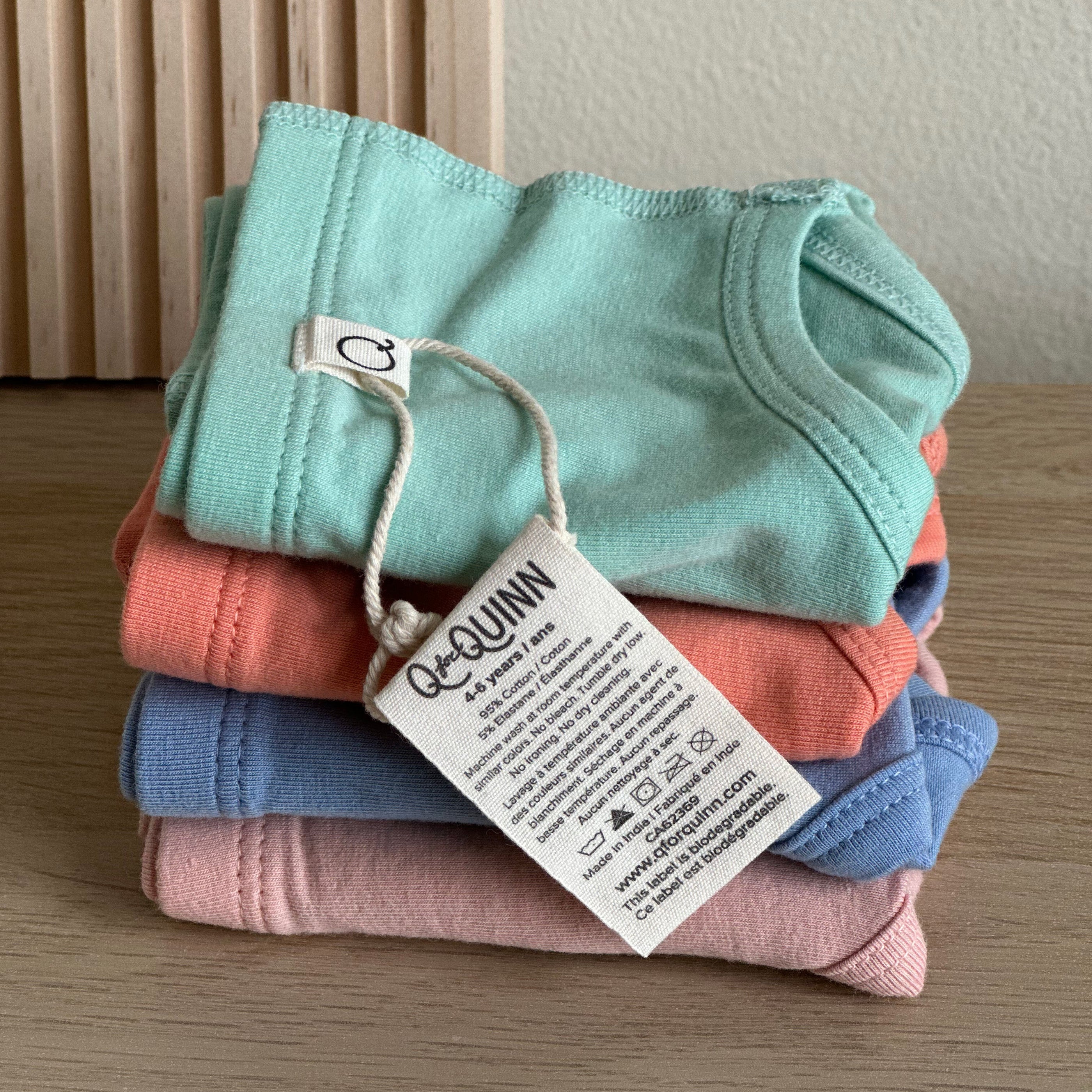 Super Bundle Luna Bikini Organic Cotton Briefs (4-pack) in mint, coral, blue and pink - folded stack with ca | Q for Quinn