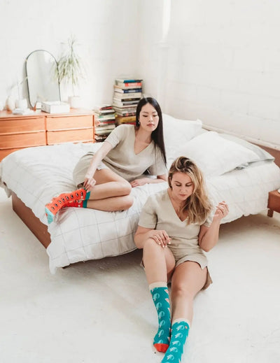 2 Ladies wearing Flax Linen Pajama Set with Organic Cotton Socks