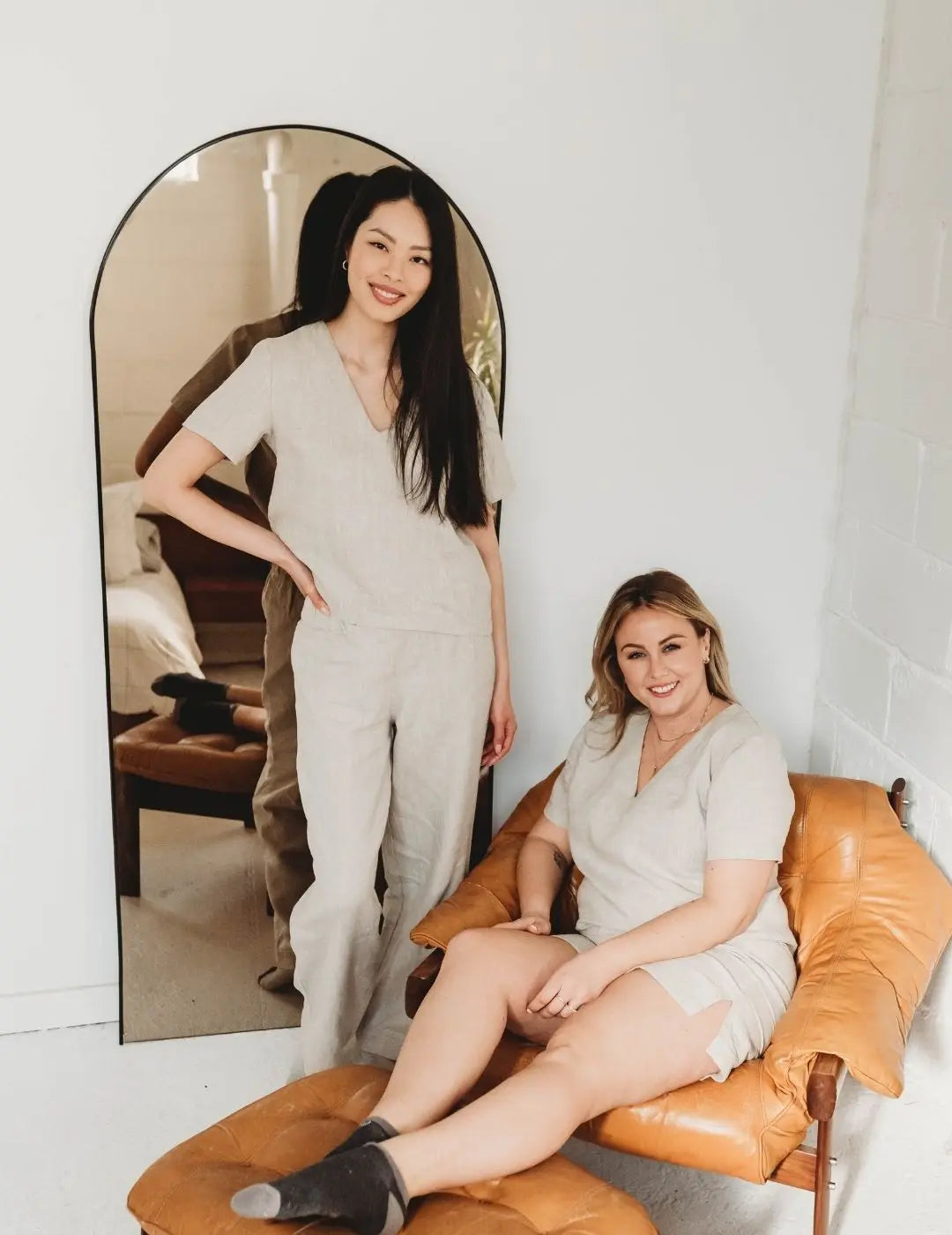 2 Ladies smiling with Flat Linen Pajama Set 