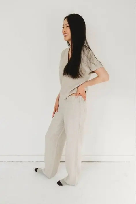A lady wears Natural  linen top and Natural linen pants 