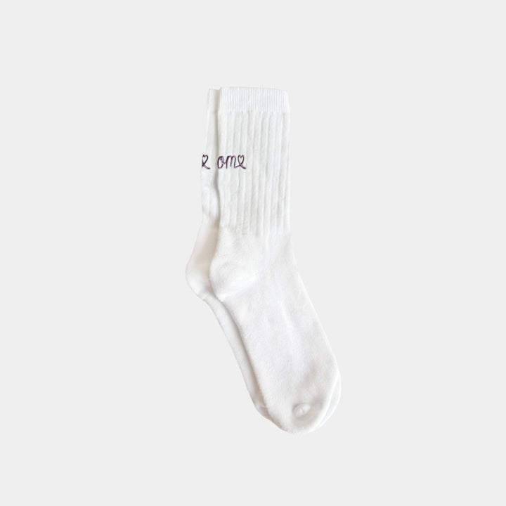 White sock with text on a white background