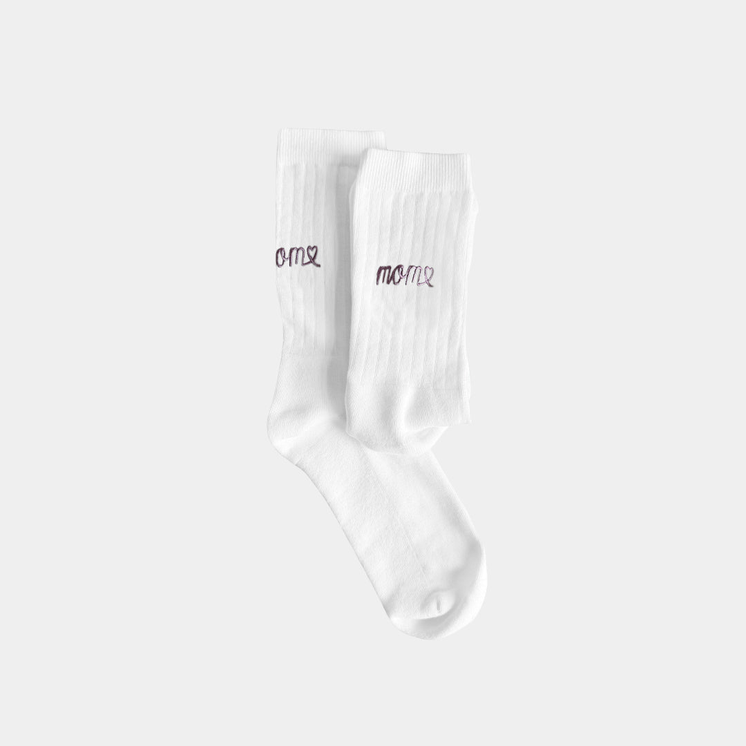White socks with black text on a white background