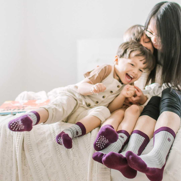 Mother and Kids wears matching socks 