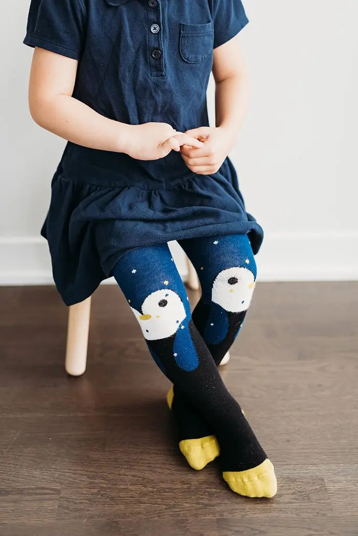 Little girl wearing penguin tights | Q for Quinn