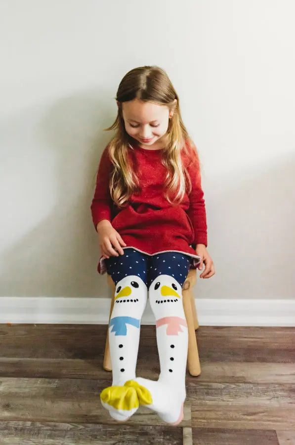 girl wear snowman tights organic cotton
