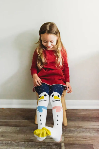 girl wear snowman tights organic cotton