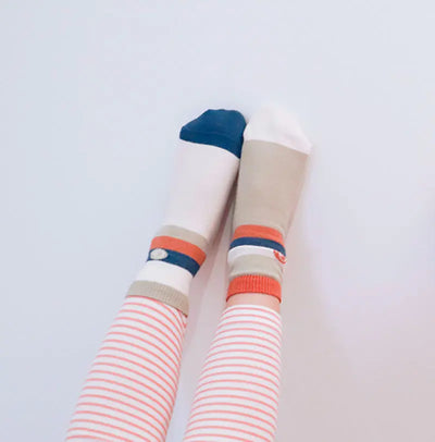 little girl wear camo stripes socks with seamless toe