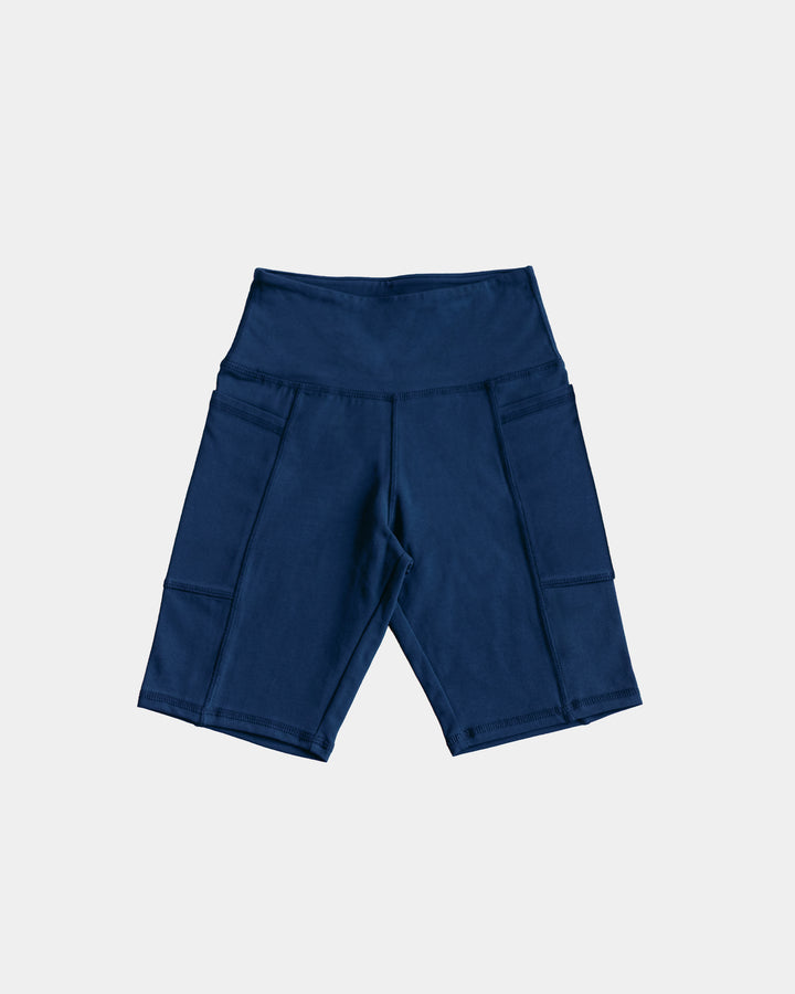 Organic Stretch Biker Short in Navy - high waist with side pockets, flat lay view | Q for Quinn