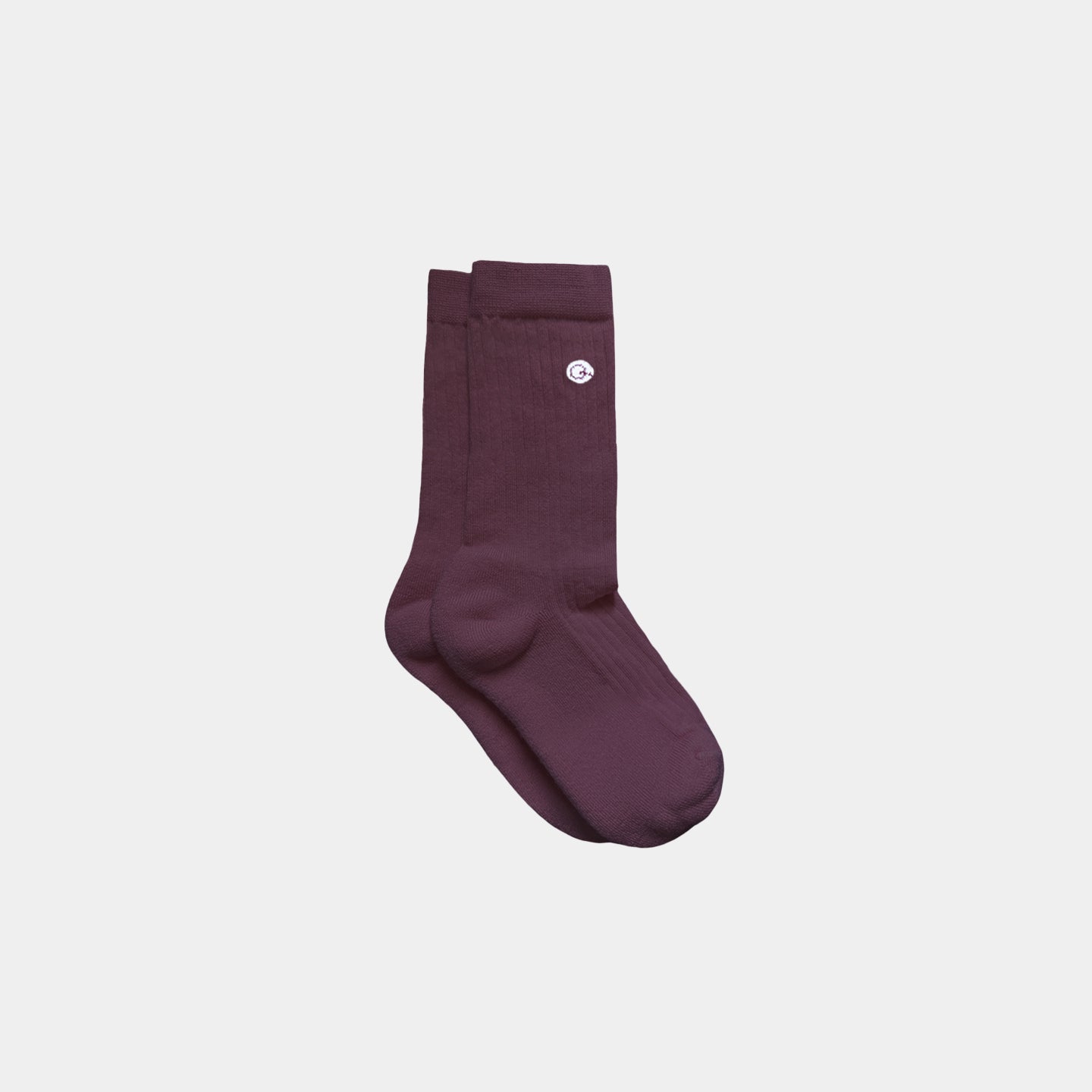 Maroon sock with a logo on a light gray background