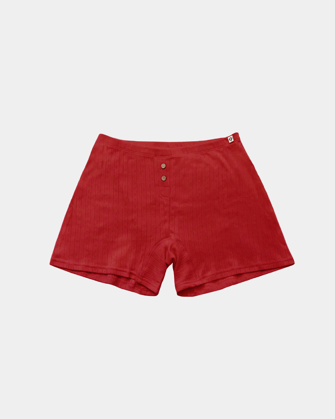 Red ribbed knit shorts with a three-button henley waistband, displayed flat against a light gray background.