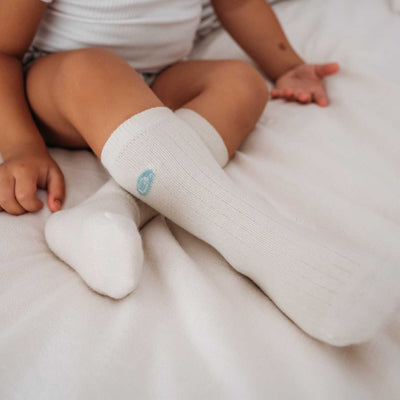 Little Kid Wears Ribbed Knee High Socks 