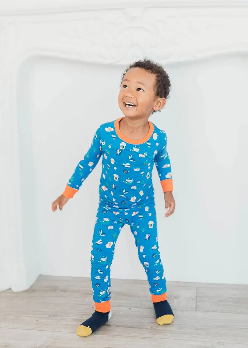 little boy wear funny creatures pajama and organic cotton  socks 