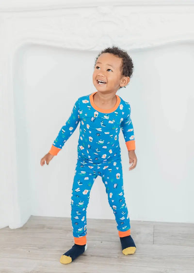 little boy wear funny creatures pajama and organic cotton  socks 
