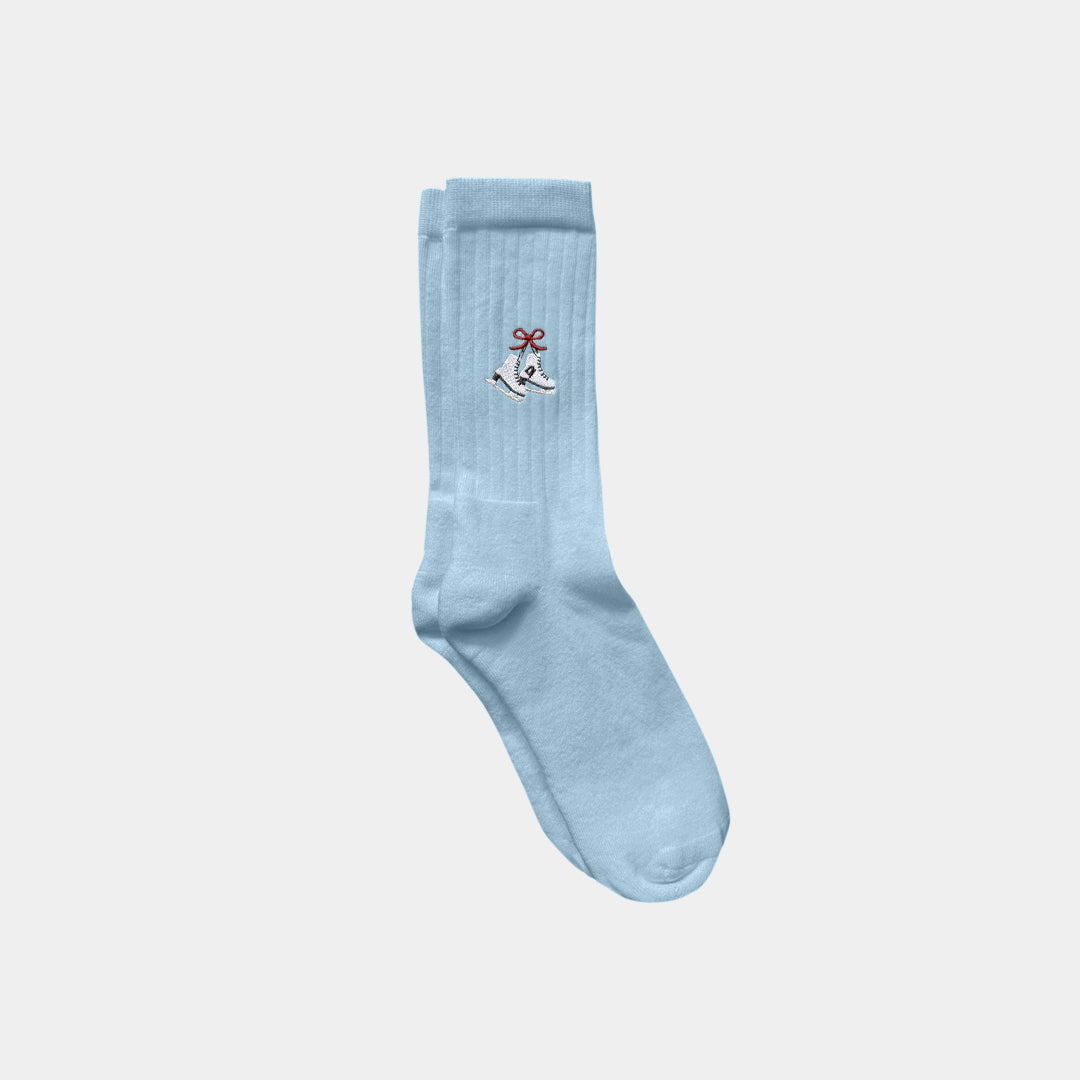 Light blue sock with a small design on a white background