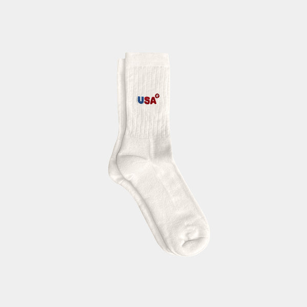White sock with 'USA' logo on a light gray background