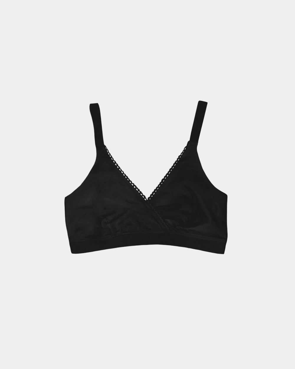 A black underwire bra with thin shoulder straps and a delicate silver beaded trim along the V-neckline, displayed against a light gray background.