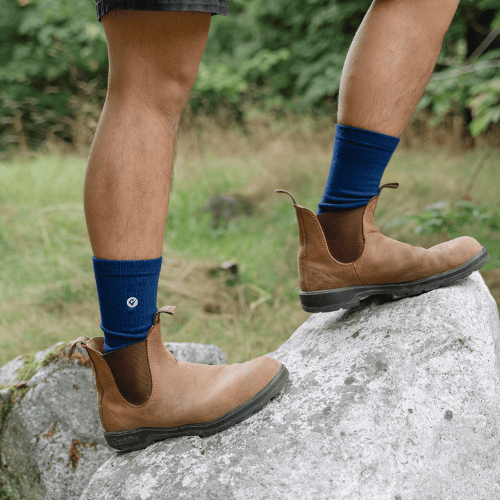Man wearing blue merino wool socks