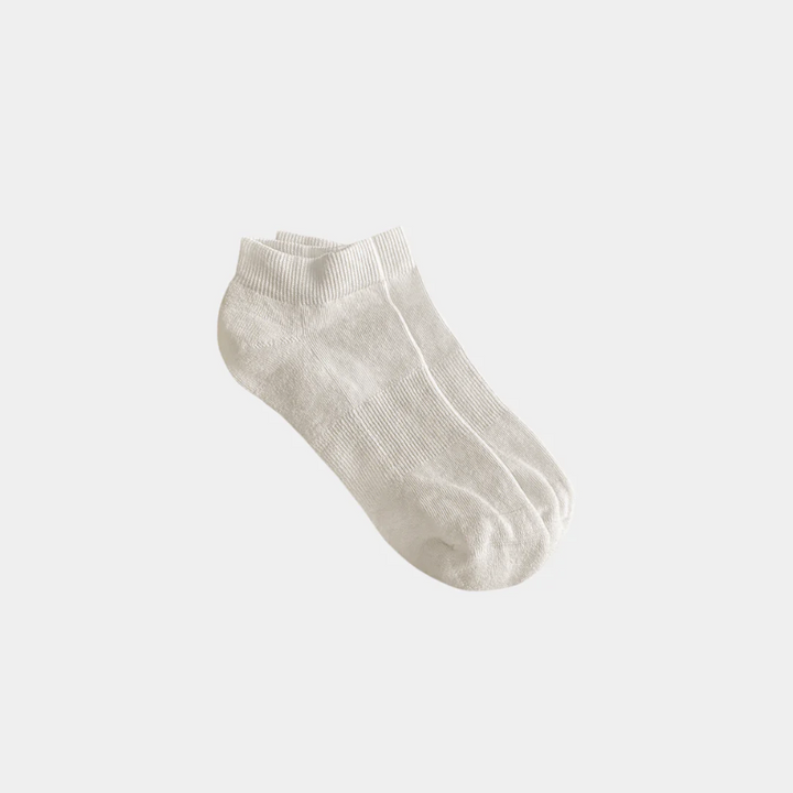 Single light gray ankle sock on a white background